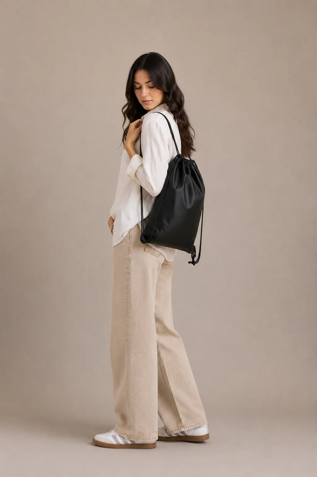 Custom private-label canvas tote with bold blue branding, carried over the shoulder